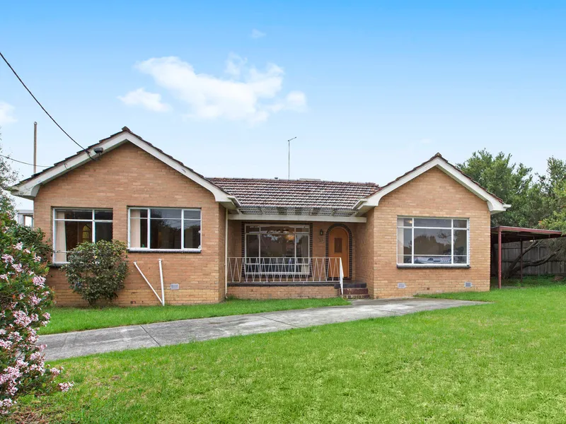 Brick Beauty On Impressive Corner Land!