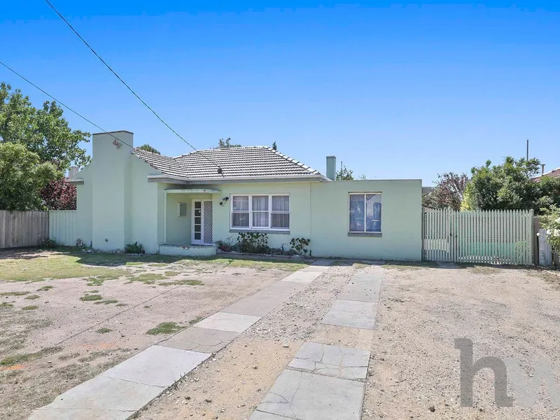 Renovate, rent out or Develop this huge block!