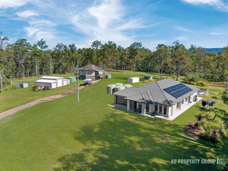 Peaceful Living on 5.4 Acres: Modern Masterpiece Main House and Cozy Functional Second House