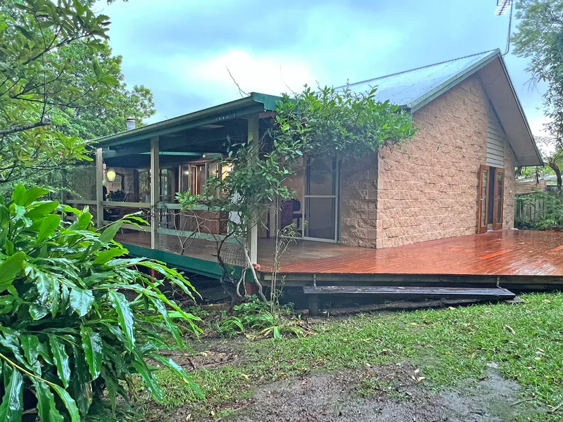 HOME IN LUSCIOUS GARDEN SETTING ...