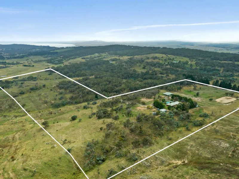 5 BEDROOM HOME SET ON 50 ACRES WITH STABLE COMPLEX AND INGROUND POOL