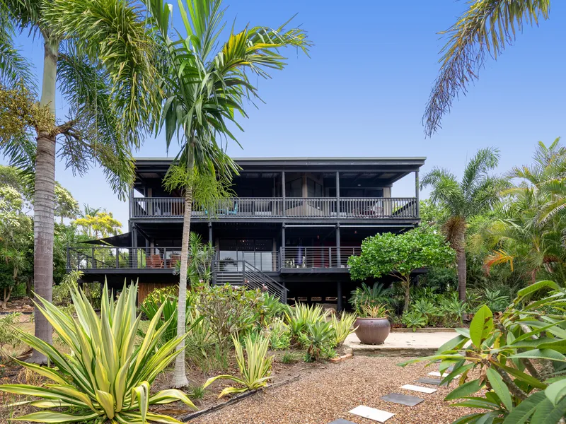 SITTING UP HIGH A TRULY MAGNIFICENT ELEVATED RESIDENCE WITH BREATHTAKING AND SPECTACULAR TREE TOP CANOPY VIEWS INC DISTANT SEA AND FRASER ISLAND VIEWS