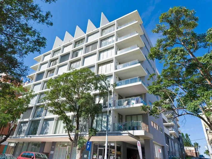 Ultra modern one bedroom apartment + study + 2 car spaces