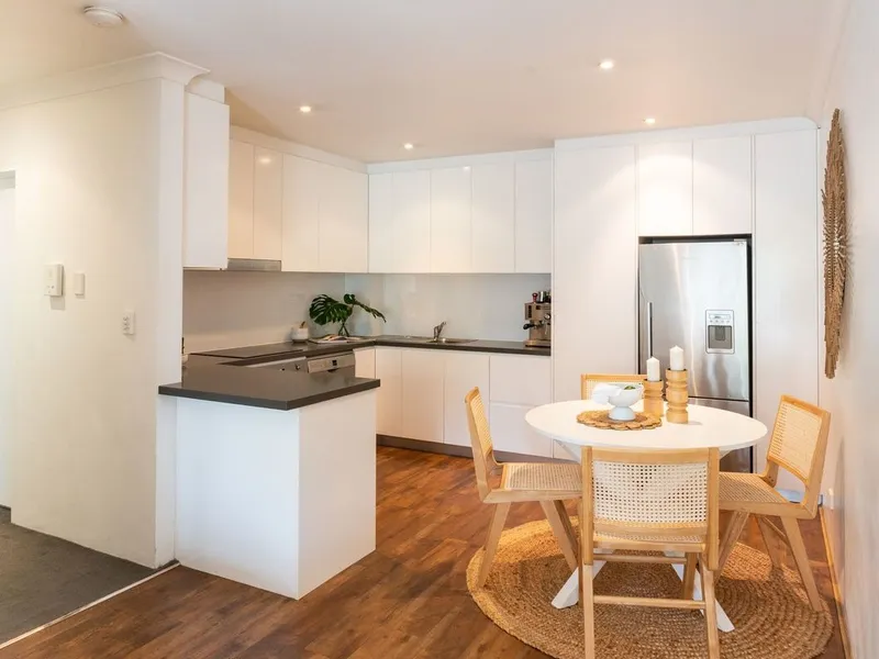 Sunlit two bedroom two bathroom apartment with parking