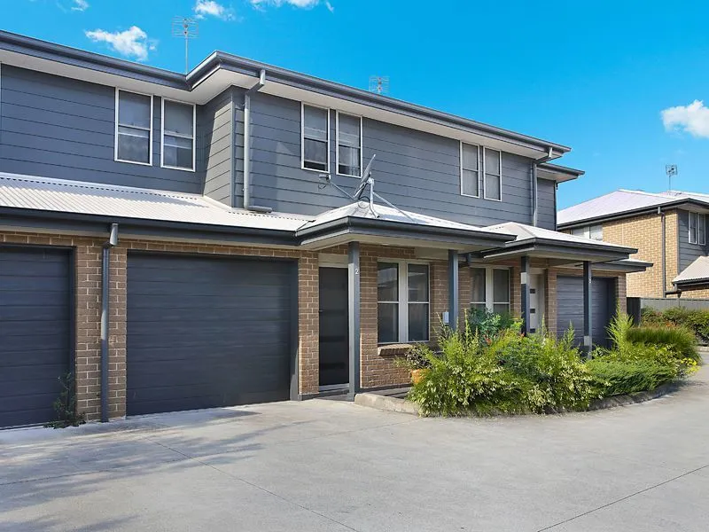 Two bedroom townhouse with ducted air-conditioning and lounge rooms on both levels.