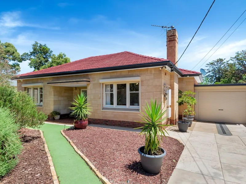 1950's well maintained home and garden on a 822sqm lot (approx.) with secure parking for 3 vehicles and/or van/boat  plus energy saving solar panels.