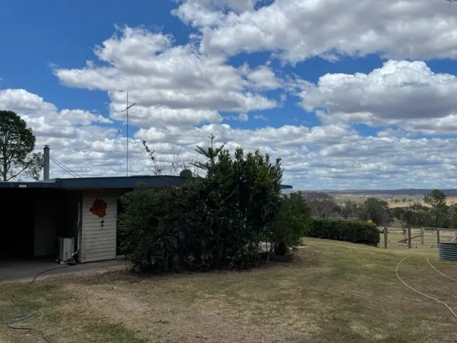 Picturesque Acreage Property with Expansive Country Views!