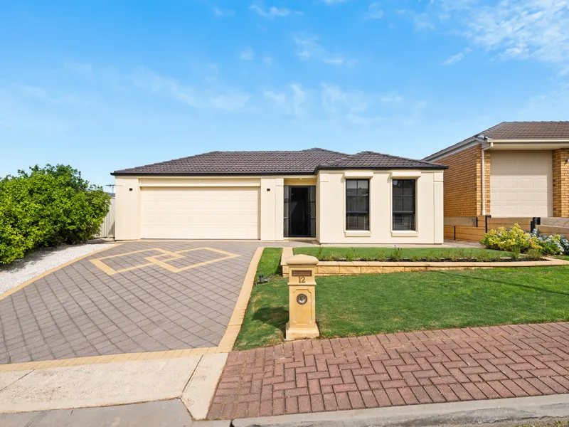 Positioned in a primal location, this spacious family home is packed with designs and features you'll be sure to love