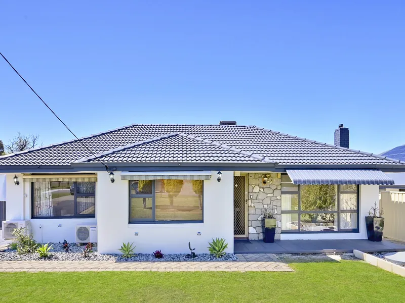 Larger Than Life - Family Home on a Full Block!