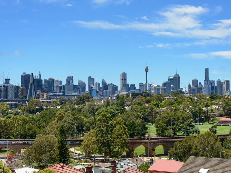 GROOVY. BRILLIANTLY REJUVENATED 1970S APARTMENT WITH SPECTACULAR VIEWS. PERFECTLY LOCATED AT HARBOUR & LIGHT RAIL.