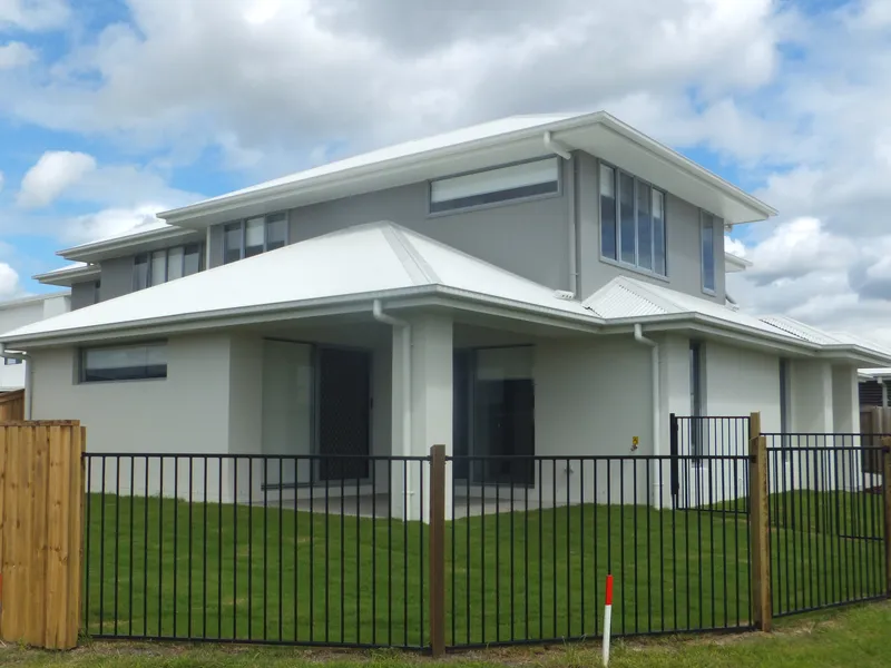 Brand new spacious duplex, larger than most nearby detached houses. 3 beds, 2 living areas, 2 bathrooms, 3 toilets, double garage, fenced & landscaped