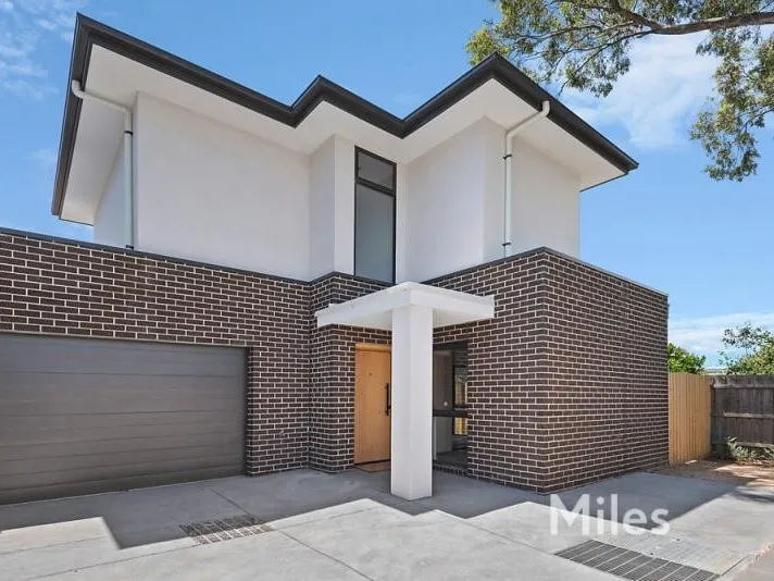 AS NEW THREE BEDROOM TOWNHOUSE