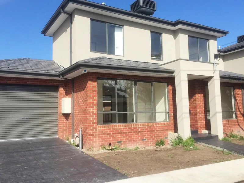 Executive living in Clayton! Stunning townhouse on a quiet block of 3