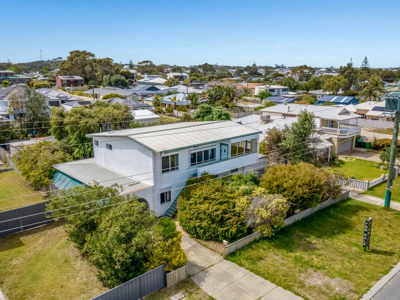 2 Storey beach shack on great block!