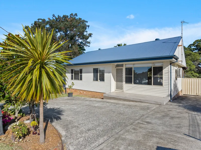 Sunlit home with oversized rear garage