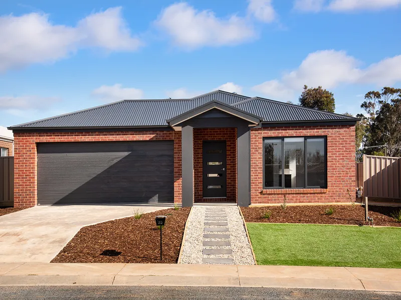 Neat, brick home on a quiet side street in popular Strathdale