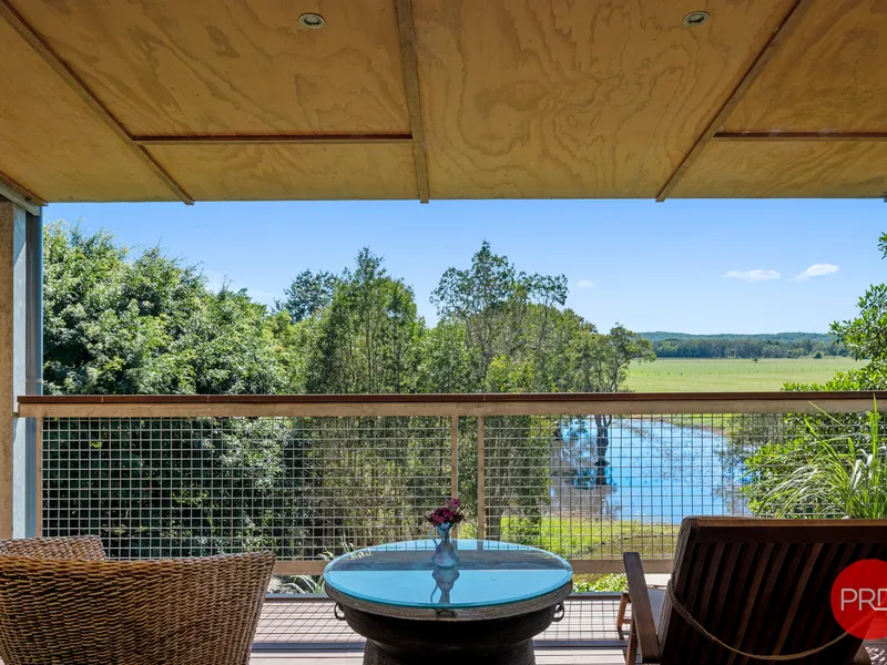 STUNNING PRIVATE OASIS ON ACRES