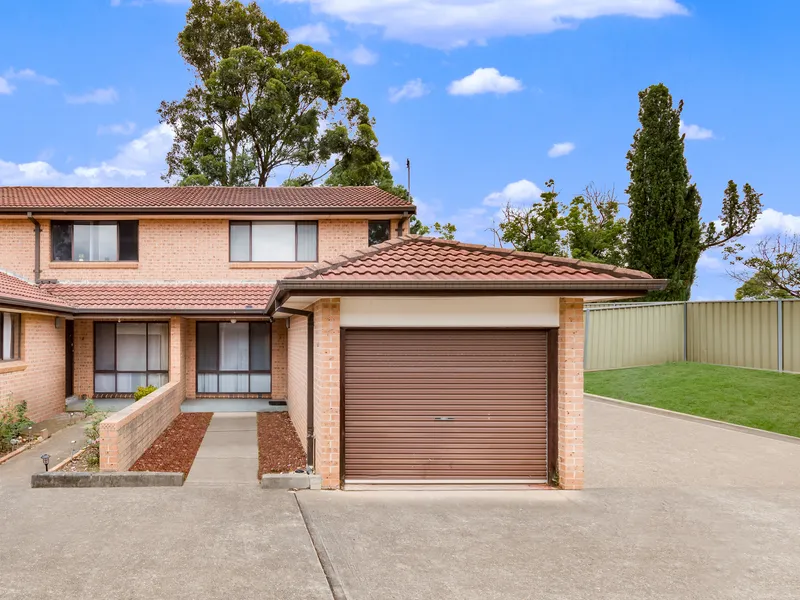 Immaculate Townhouse with Oversized Backyard