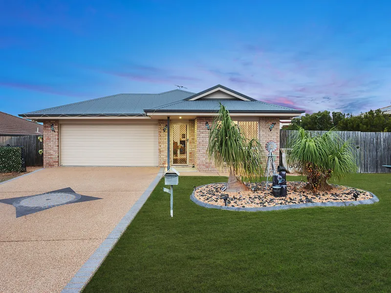 More than your standard 4 bedroom, 2 bathroom brick home
