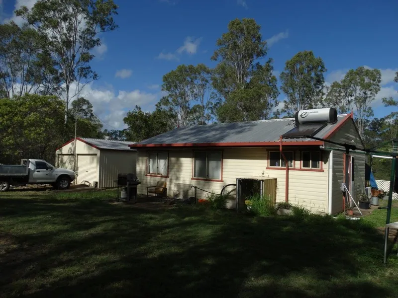 6 ACRES ZONED WHITE WITH 2 BRM HOME