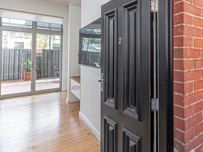 Lofty, light and incredibly lovable!  A sensational town house offering space, style, and security.