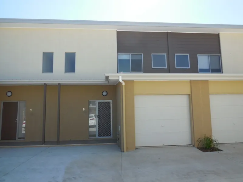 Modern Townhouse with three bedrooms, ensuite, powder room, study nook and garage and courtyard