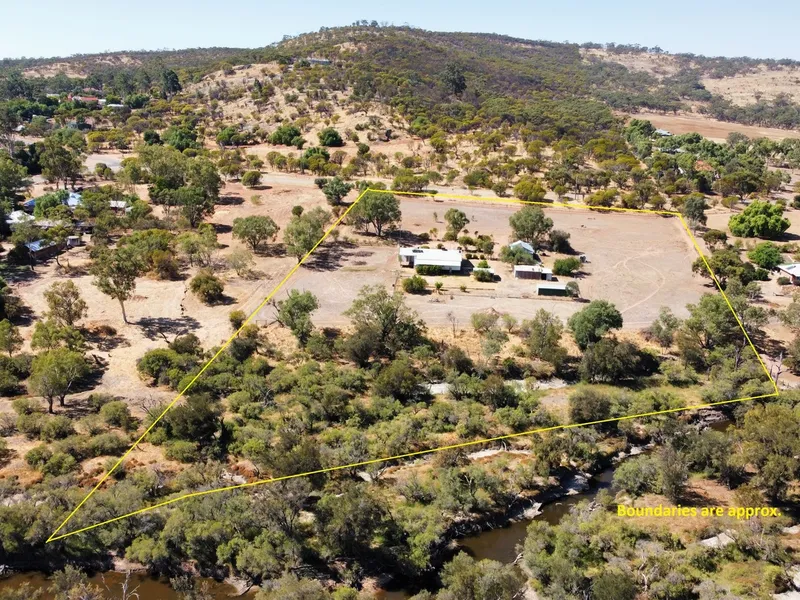 Between River & Mountain!