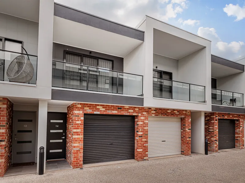 Superb townhouse is sought after locale