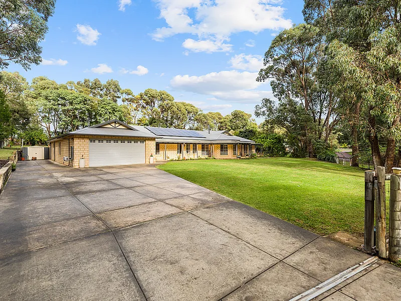 FULLY RENOVATED HOME, SIX CAR GARAGE AND SPARKLING POOL!
