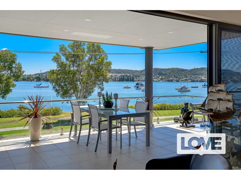 Grand Living With Uninterrupted Lake Views