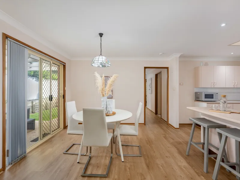 SURROUNDED BY GREENERY YET WITH SHOPS NEARBY!