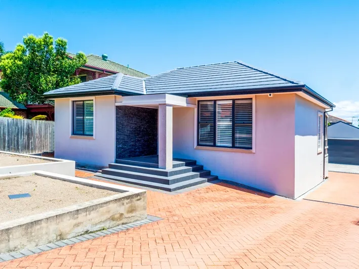 ** DEPOSIT TAKEN ** Smart and Stylish Family Home with Huge Garage and Large Land