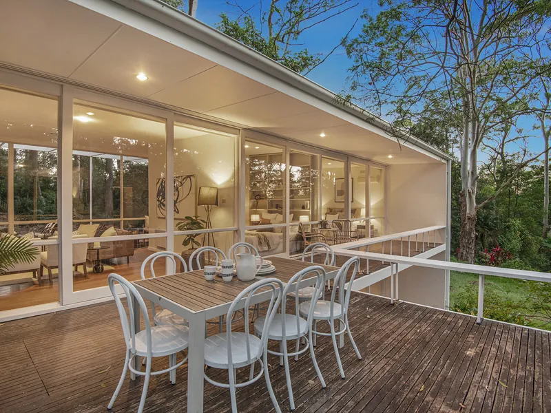 Be at one with nature in this unique mid-century home