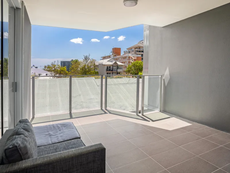 Live By The Riverside In This Designer Executive Apartment