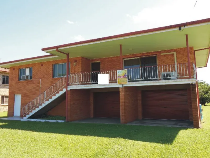 HIGHSET BRICK HOME ON MAIN STREET !