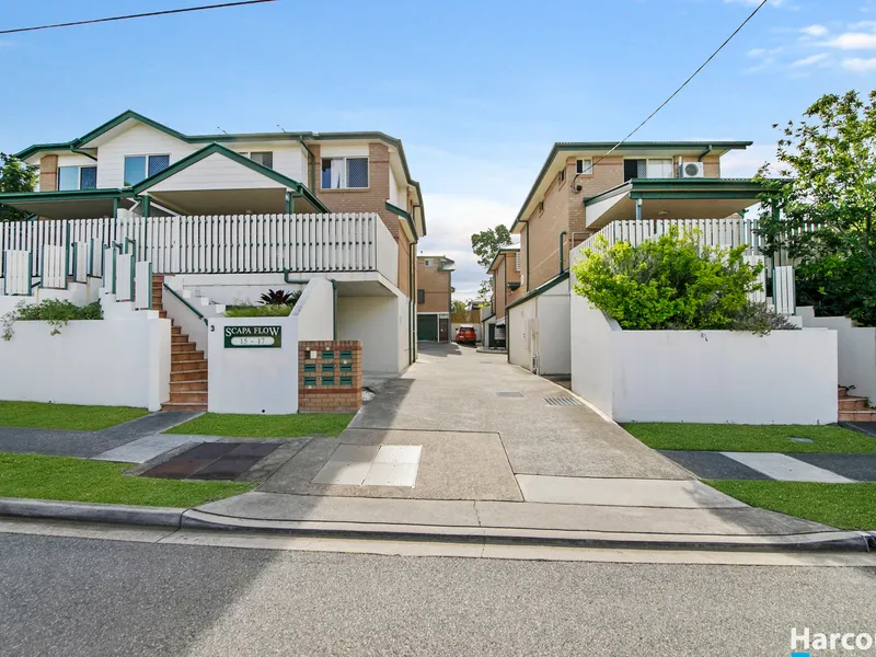Tri-Level Townhouse with 4 Car Spaces! 