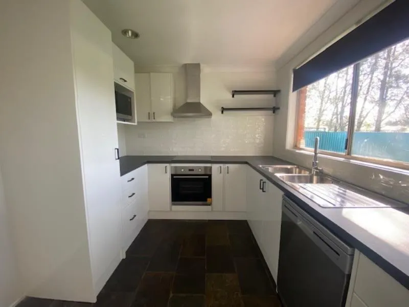 BRAND NEW KITCHEN- FRESHLY PAINTED