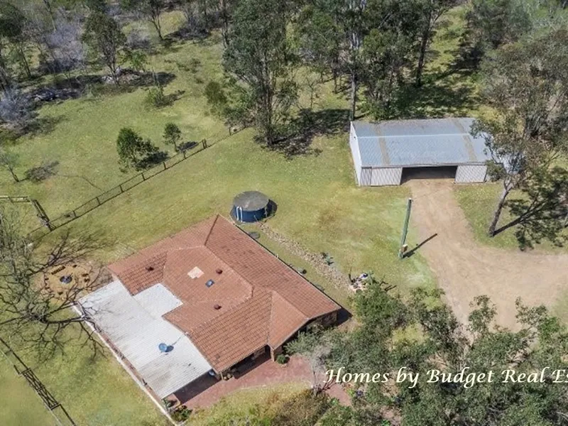 LOCATION, PRIVACY, LARGE ACREAGE AND HOME