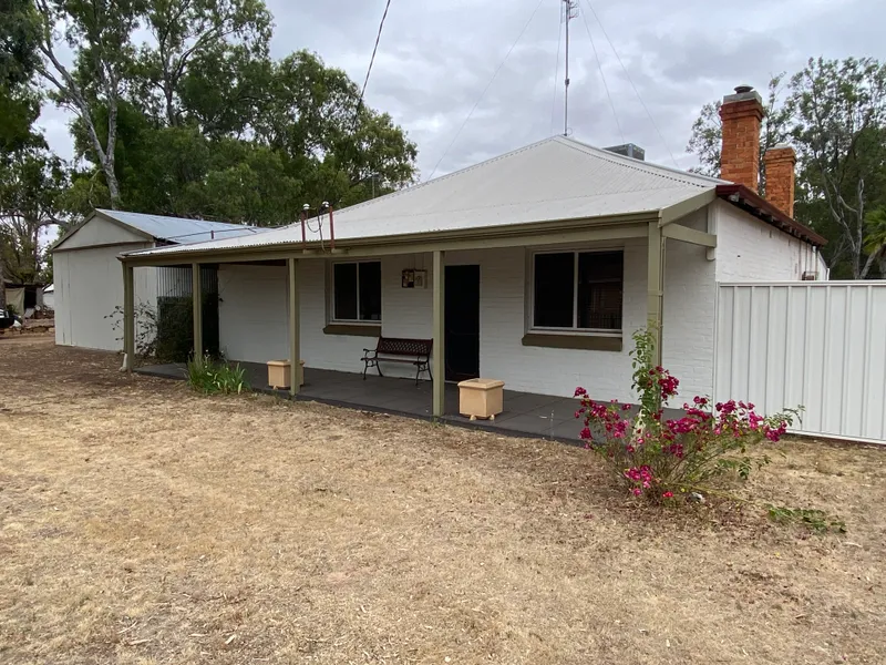 Tastefully renovated fine character riverfront home on 1 acre