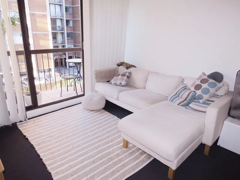 LOVELY ONE BEDROOM UNIT WITH NORTH FACING BALCONY + PARKING