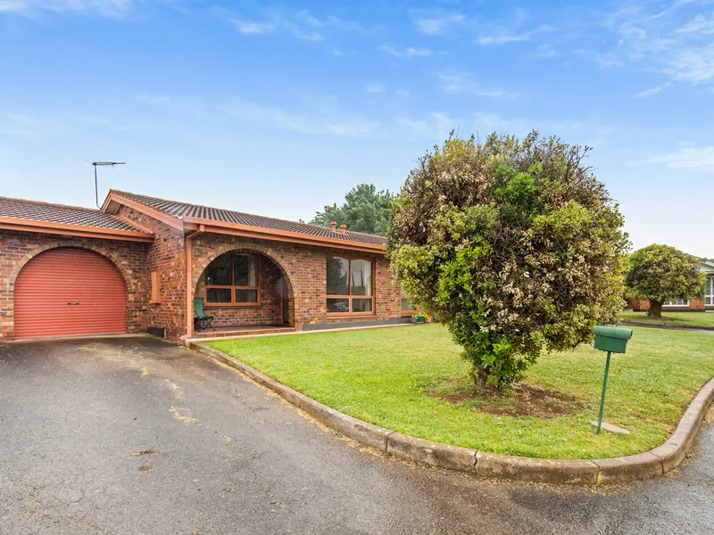 Enjoy low maintenance living with this delightful, courtyard home in a highly accommodating location