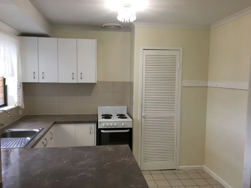 4 Bed room home close to beach, schools, shopping and recreation. Lot of space for a family.