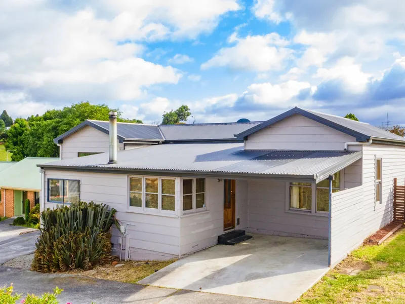 With a little TLC this property becomes a wonderful home!