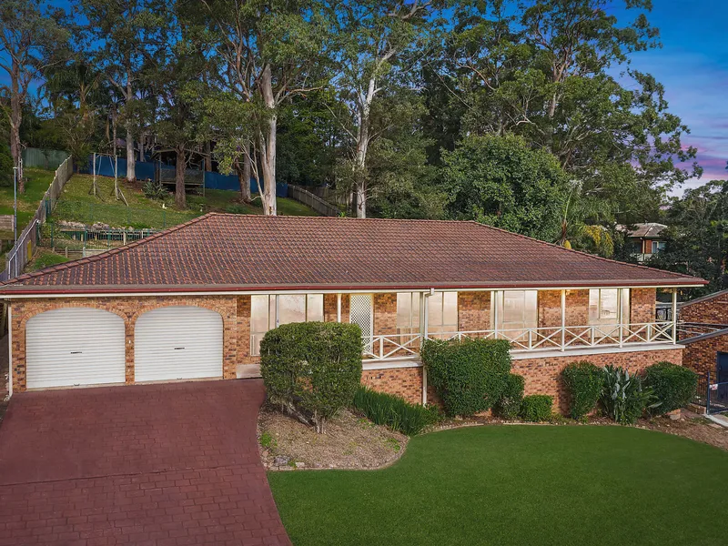 Large single level home in coveted suburb