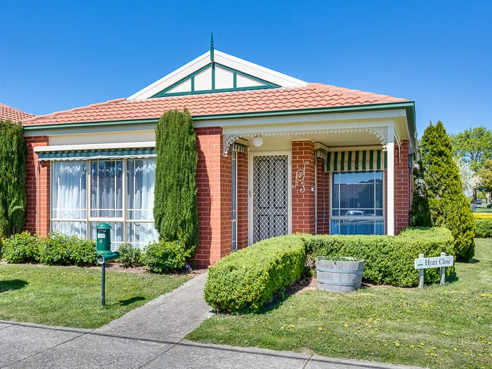 NO MAINTENANCE LIVING IN THE HEART OF TOWN