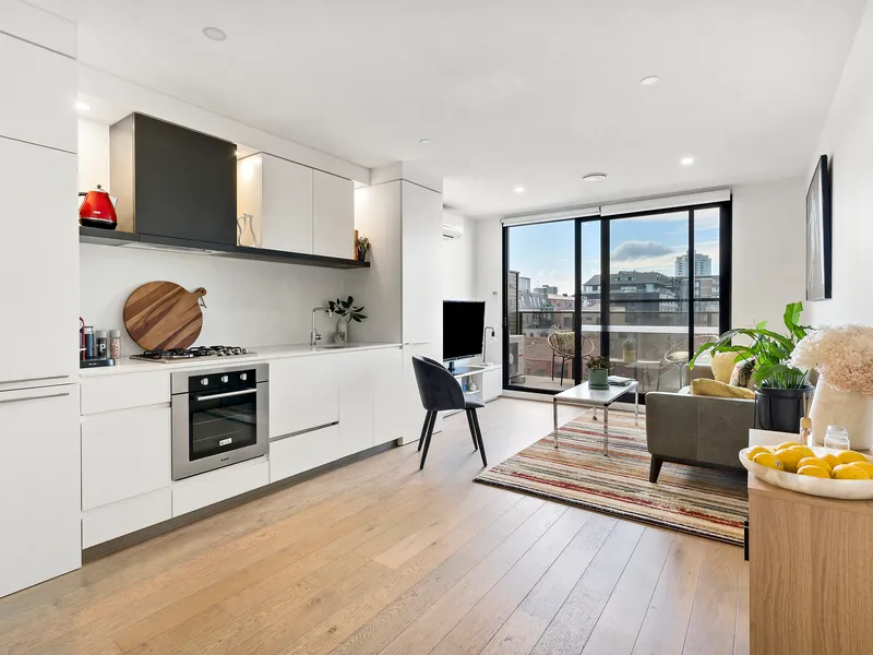 Sleek style, light-filled space, and a sky-high surprise - FURNISHED