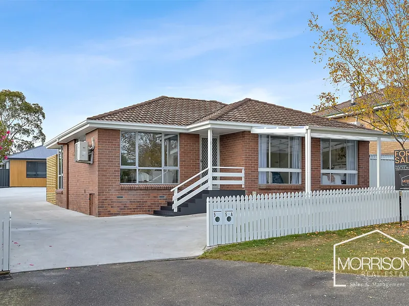 Low Maintenance and Fully Renovated Suburban Gem