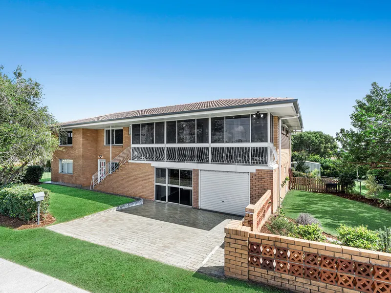 ELEVATED FAMILY HOME WITH ENDLESS POTENTIAL + DOUBLE STREET ACCESS