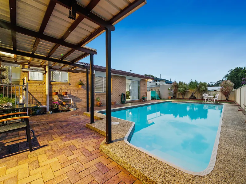 WOW - Lowset Brick, Multiple Living Areas, Plus a Pool