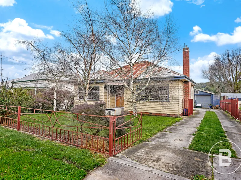 HOME ON LARGE BLOCK NEEDING RENOVATION/DEMOLITION